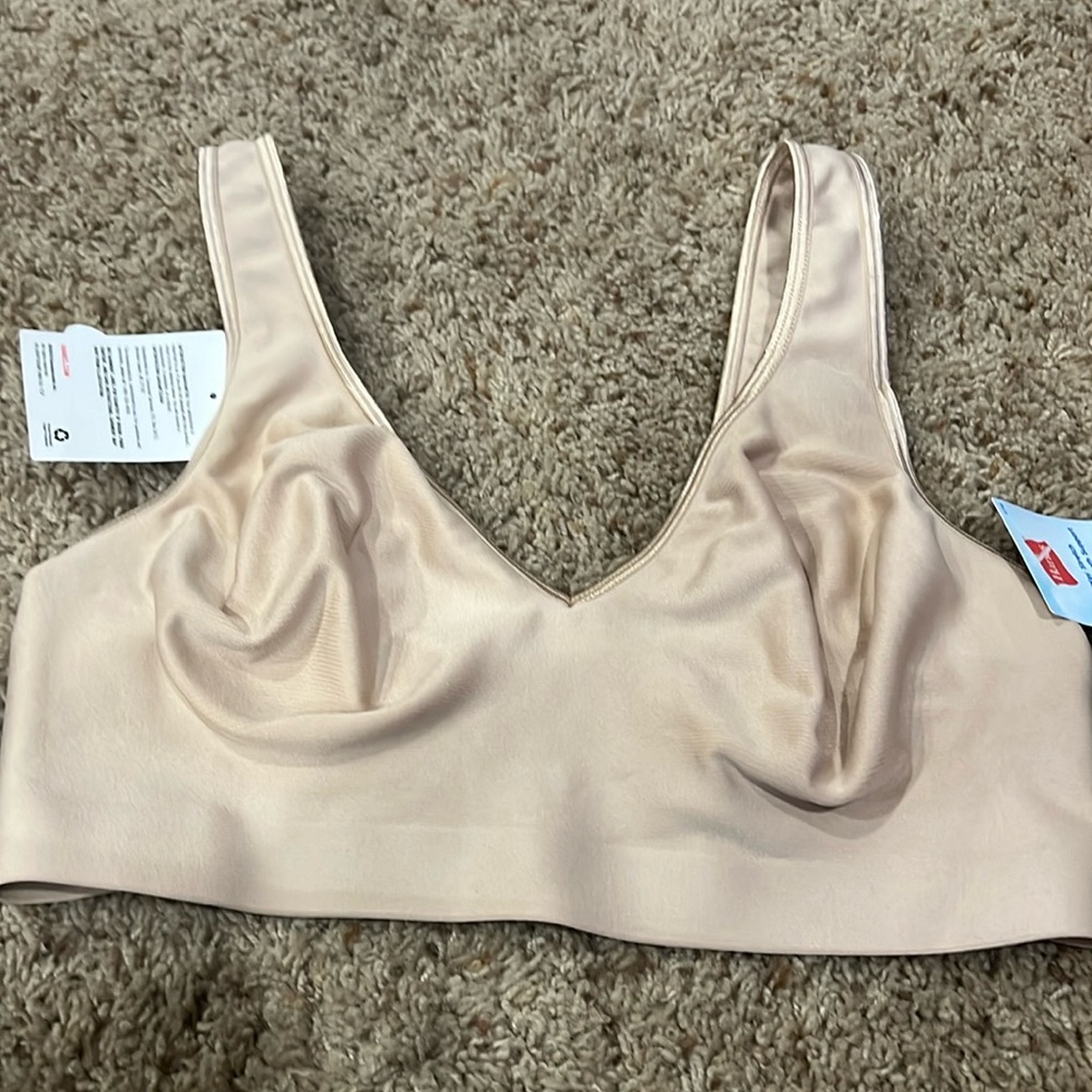 Nude Hanes bra size large.   New with tags